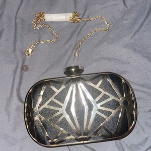 Clutch Small-gold Jewel Metal Frame lift-clasp closure.